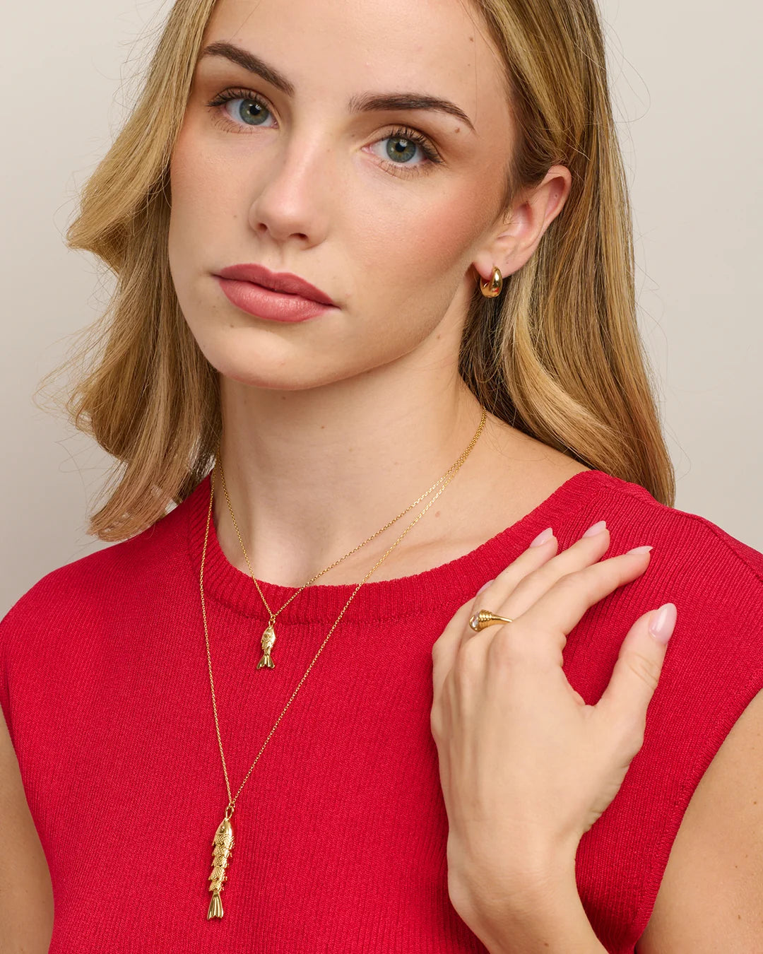Gold fish necklace